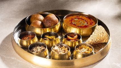 An image of a thali with delicious indian foods - Kaldan Samudra Palace